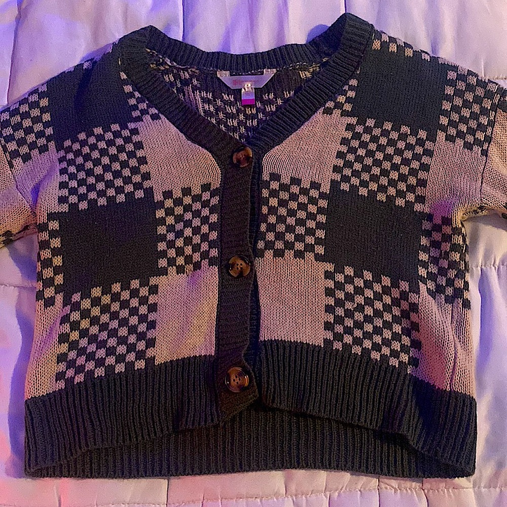 “No Boundaries” sweater in a size extra small(XS).